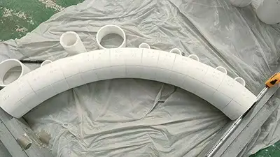 To protect ceramic cylinder liner bends from long-term exposure to highly corrosive and abrasive media, which fittings are suitable?